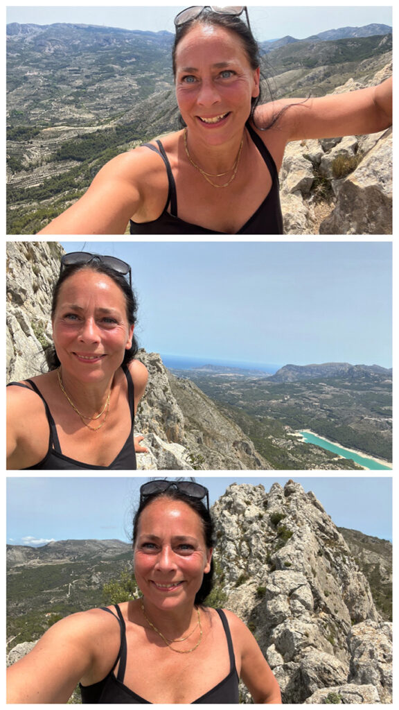 Ulrike Nehls glücklich und verschwitzt auf dem Gipfel eines Berges in Spanien